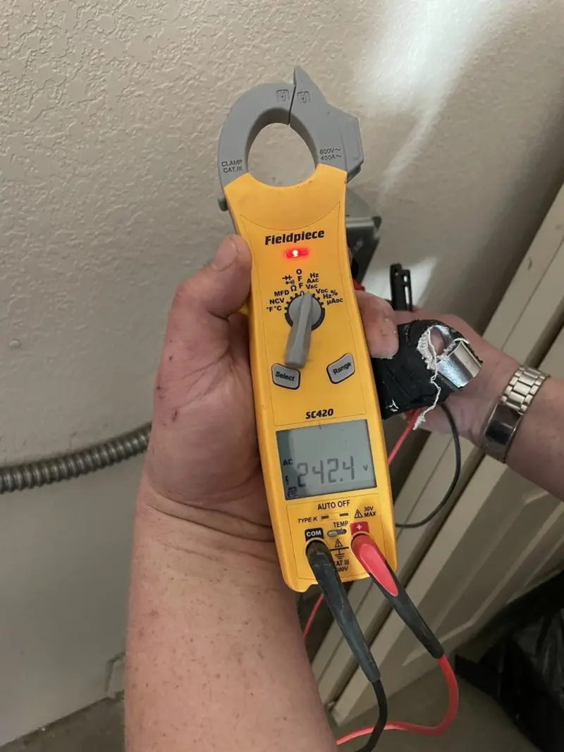 Voltage testing with clamp meter during Circuit Breaker Repair in Slaughterville